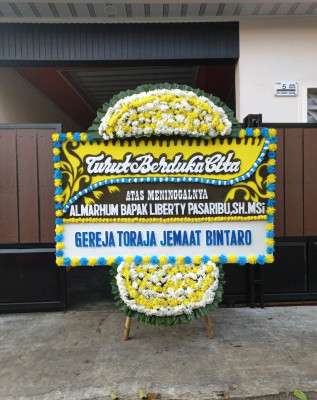 Papan Bunga Duka di Rumbai